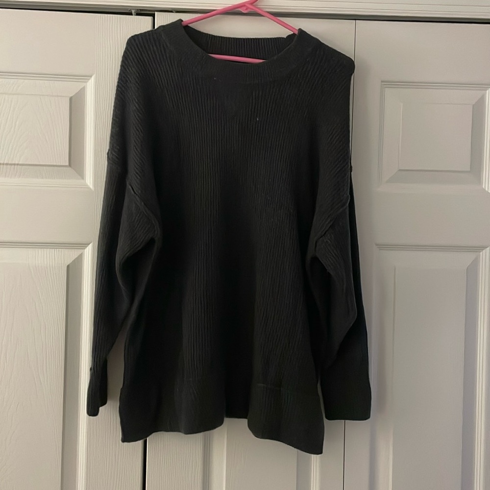 Oversized sweater with side slits